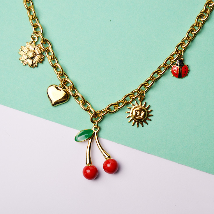 collar dorado charm cerezas y mariquita collar dorado charm cerezas y mariquita