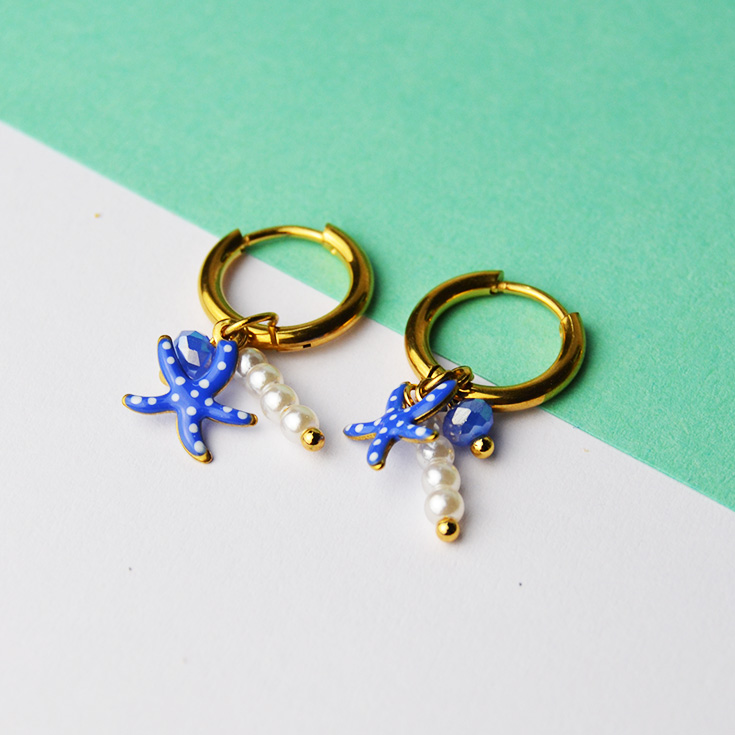 pendientes aritos dorados charm estrella de mar azul