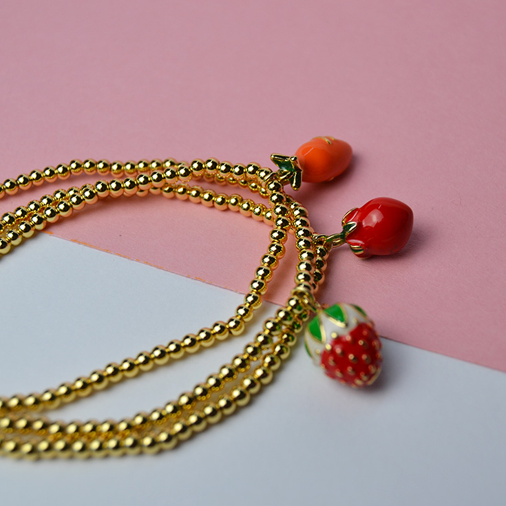 pulsera cadena dorada charm fruta