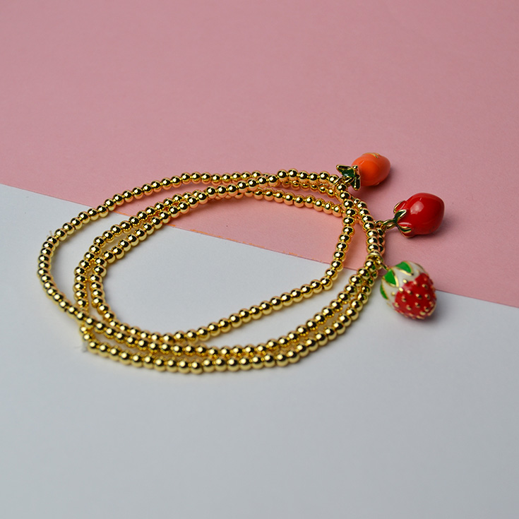 pulsera cadena dorada charm fruta