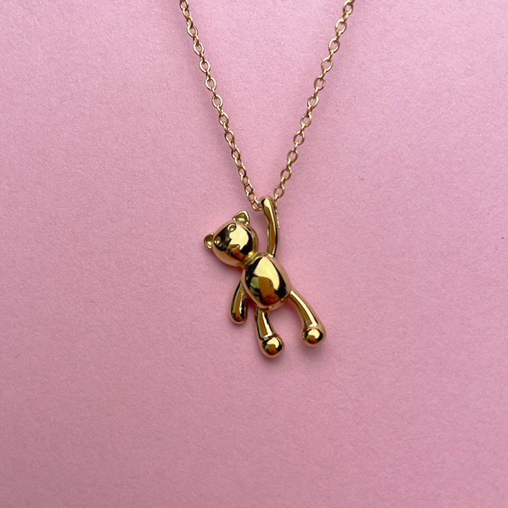 collar osito dorado