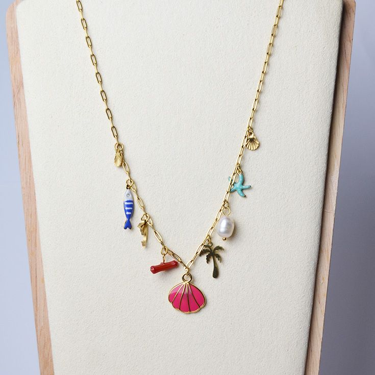 collar dorado con concha coral y mas colores collar dorado con concha coral y mas colores