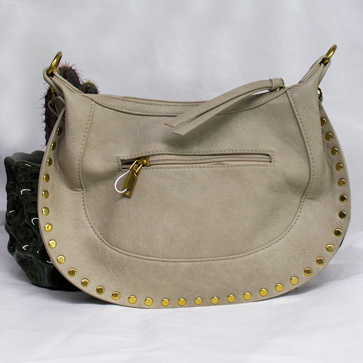 bolso beige tachuelas