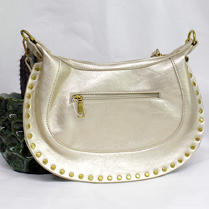 bolso dorado tachuelas