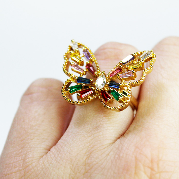 anillo dorado mariposa con cristales de colores