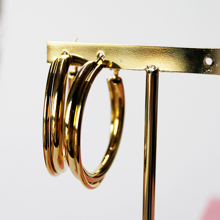 pendientes aro dorado entrelazado grueso
