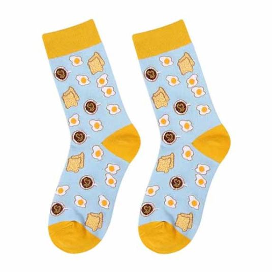 happy feet calcetines desayuno huevos tostadas