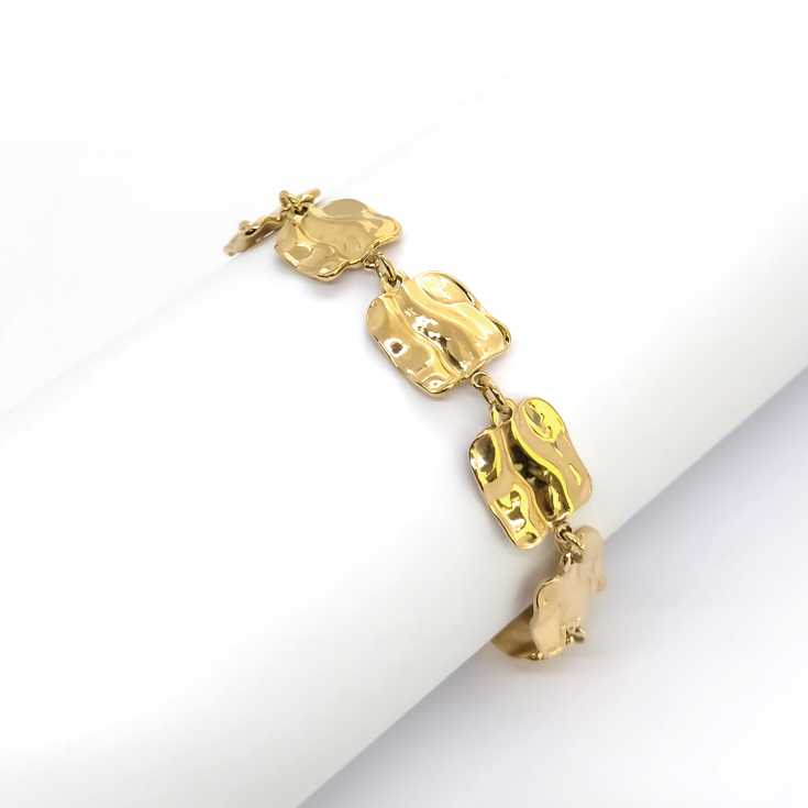 pulsera dorada piezas repujadas