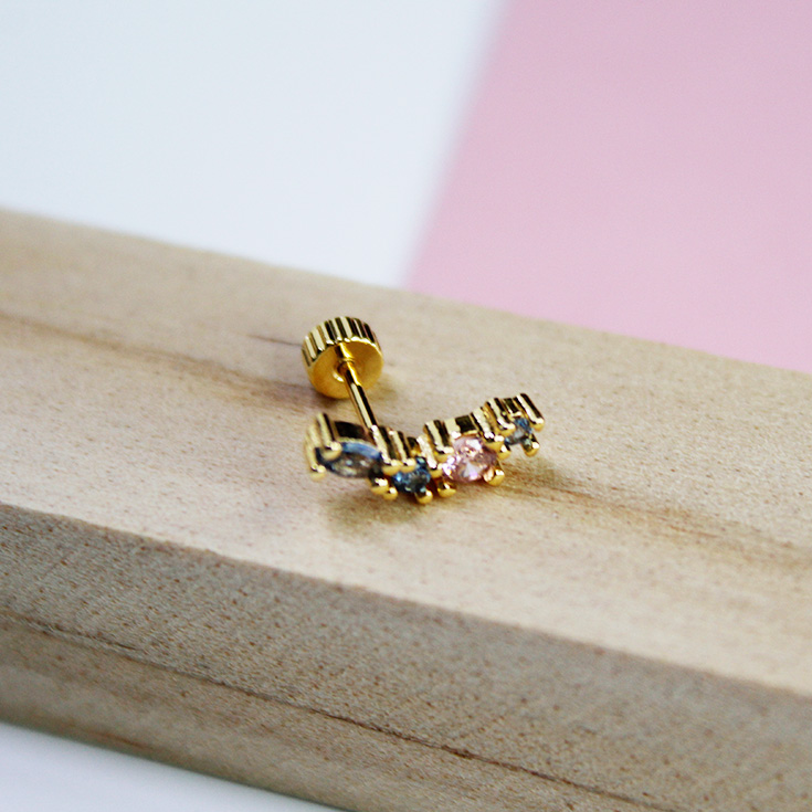 piercing dorado con circonitas de colores