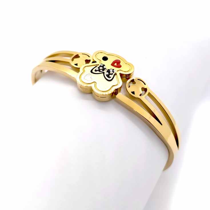 pulsera brazalete dorado con osito con pajarita