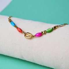 pulsera tobillera dorada con piedras de colores y caracola dorada