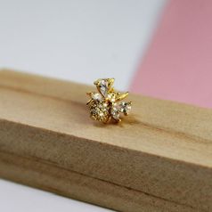 piercing dorado con circonitas blancas