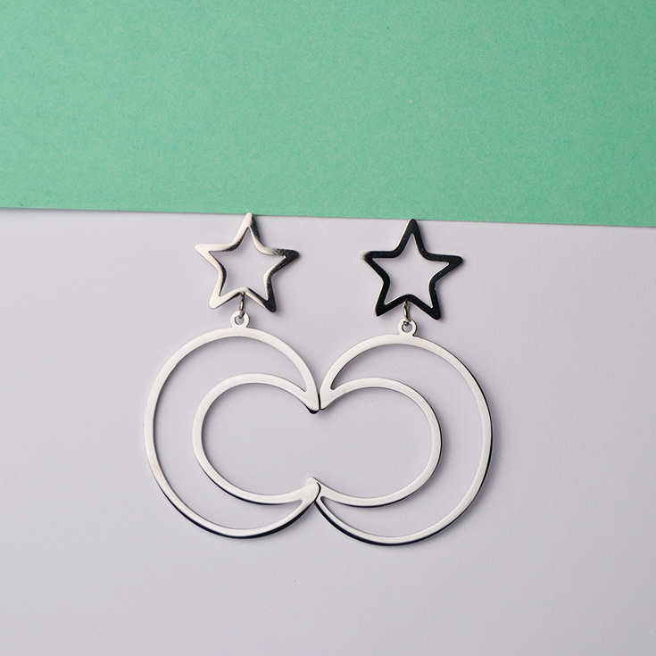 pendientes plateados largo estrella con luna