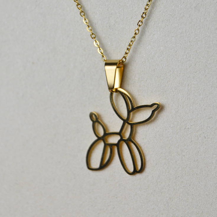 collar dorado silueta de perro globo