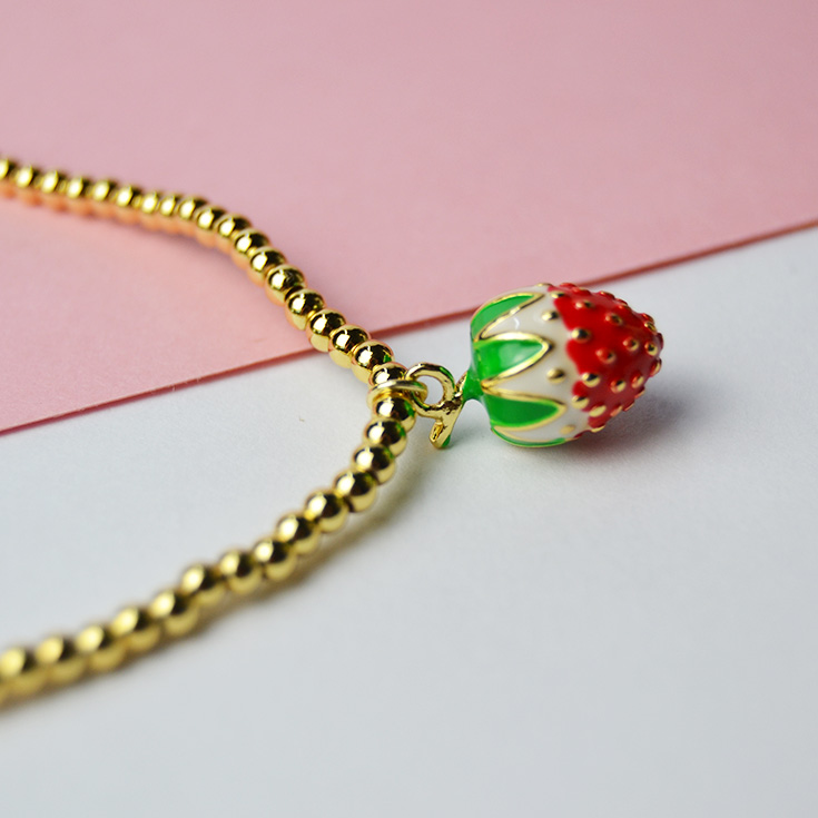pulsera cadena dorada charm fruta