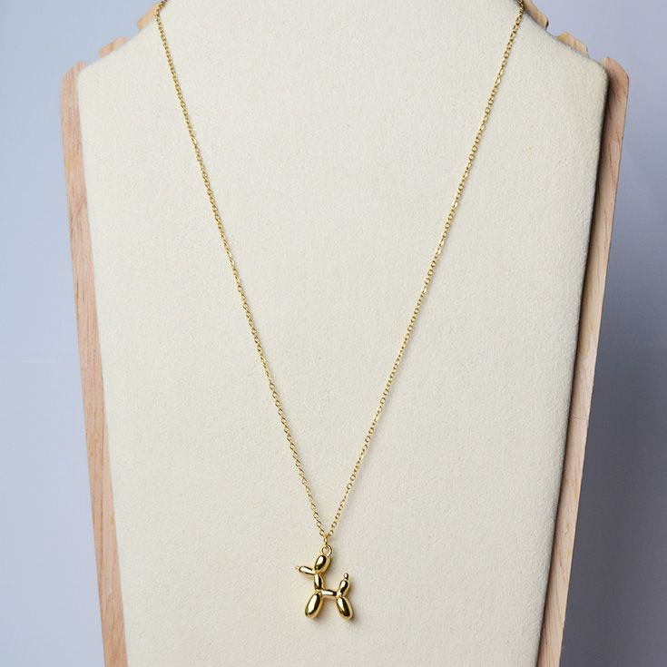 collar perro globo dorado