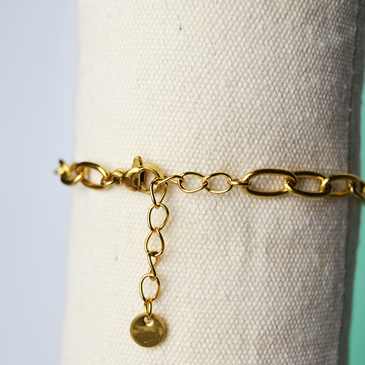 pulsera eslabones charm peces y estrella de mar