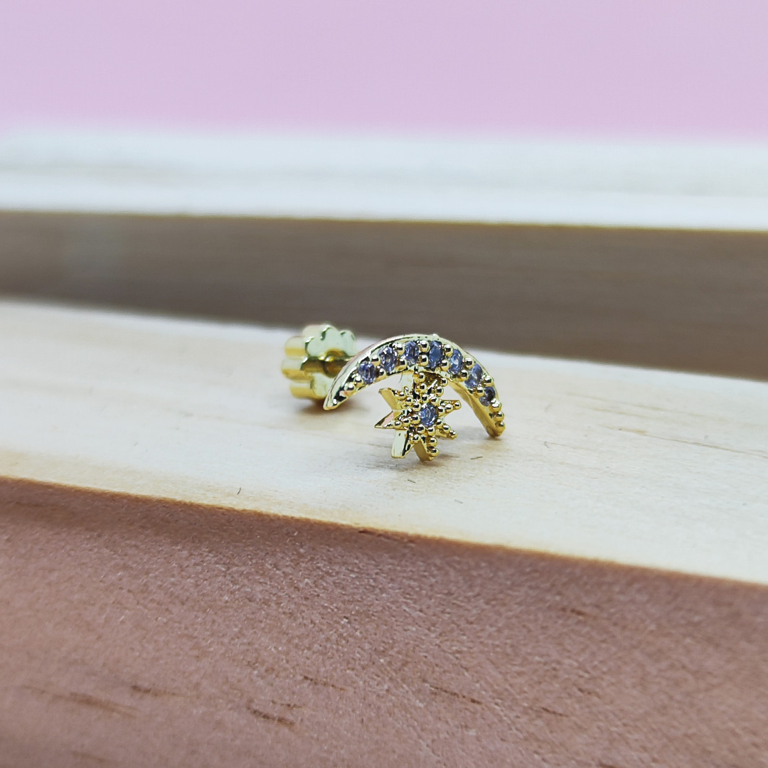 piercing dorado estrella con luna y circonitas blancas