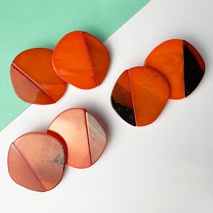 pendientes grandes de boton naranja