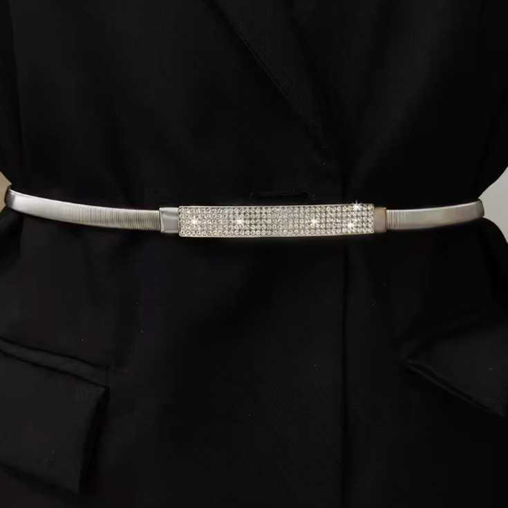 cinturon elastico con strass plateado