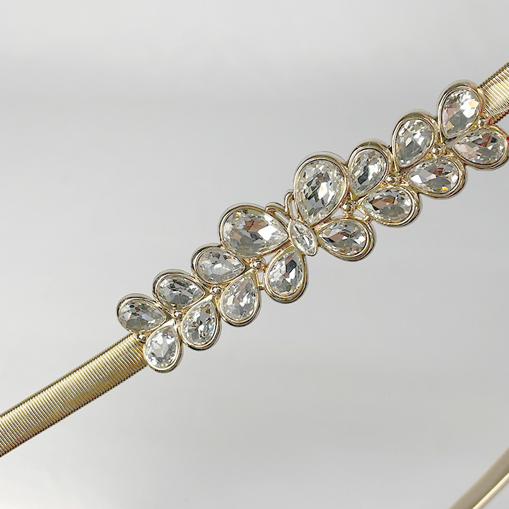 cinturon elastico metalico con strass dorado