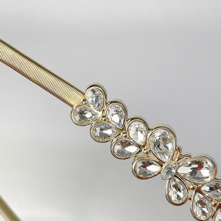 cinturon elastico metalico con strass dorado